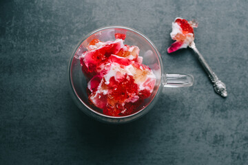 Fruit milk colorful jelly cake in a glass bowl.
Multicolored gelatin dessert
