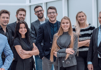 Smiling and confident business team standing together