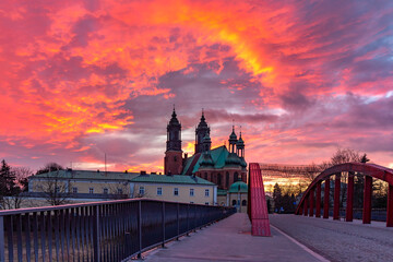 The Bishop Jordan Bridge over Cybina River and Poznan Cathedral at gorgeous sunset, Poznan, Poland.