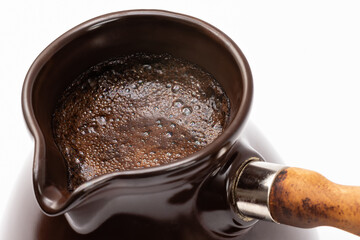 ceramic turk for coffee on white background