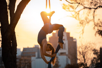 Woman doing Fabric acrobatic art