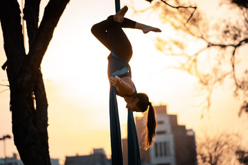 Woman doing Fabric acrobatic art