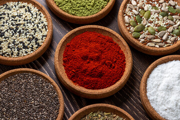 Multicoloured ingredients and spices for cooking healthy food and salads.