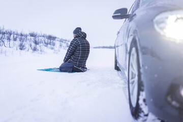 Fototapeta na wymiar Muslim traveler praying in winter mountain , high quality 