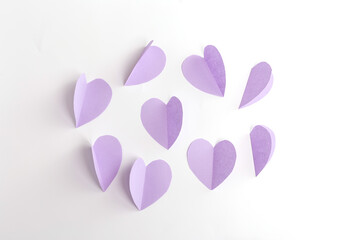 purple paper cut out heart for craft, step 2 of instruction, art project paper flowers, DIY, spring holiday craft activity for kids