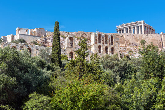 Acropolis of Athens, Greece. View of Herodes Odeon and Parthenon temple.