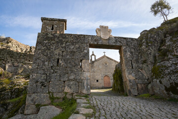 Fototapeta na wymiar Monsanto historic stone village entrance with Santo Antonio chapel, in Portugal