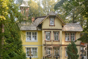 Fototapeta na wymiar Old wooden house of last century. Building restoration. Selective focus