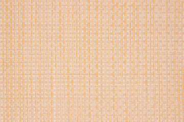 Background of a wicker plastic stand for hot dishes