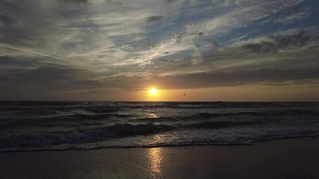 Beautiful sunset and waves near Madeira Beach, Florida, U.S.A