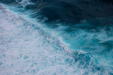 Sea surface background with waves and foam