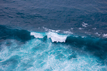 Sea surface background with waves and foam