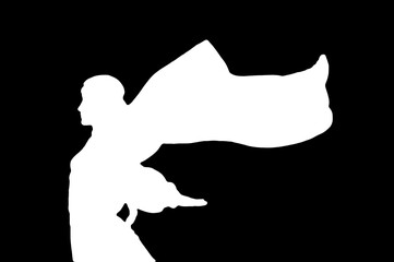 Woman silhouette on black background (wind effect)