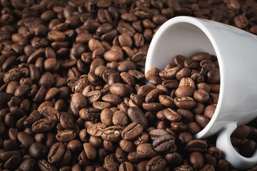 Coffee cup with roasted beans with copy space for your text