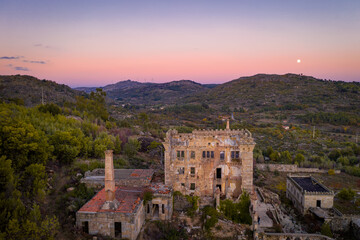 Obraz premium Drone aerial panorama of Termas Radium Hotel Serra da Pena at sunset in Sortelha, Portugal