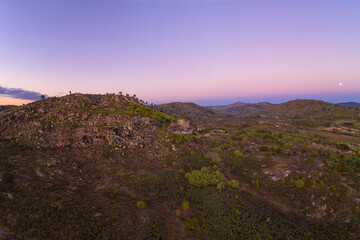Drone aerial panorama of Termas Radium Hotel Serra da Pena at sunset in Sortelha, Portugal