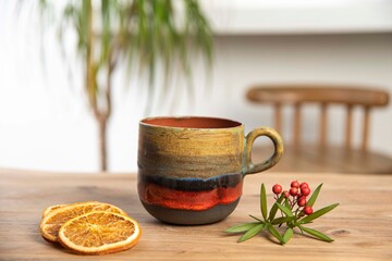 porcelain coffee mug on wooden table