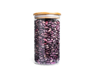 Beans in a glass jar isolated on a white background.