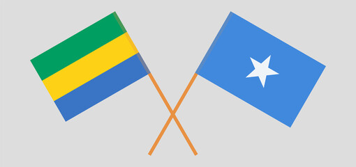 Crossed flags of Gabon and Somalia. Official colors. Correct proportion