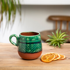ceramic coffee cup on wooden table