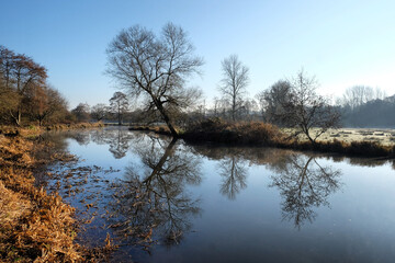 Fototapeta na wymiar Winter light on The River Wey navigation in Godalming, Surrey