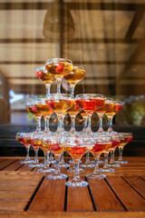 a tower of wine-filled glasses