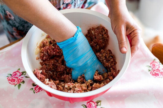 Mixing Meatball Mixture To Make Meatballs