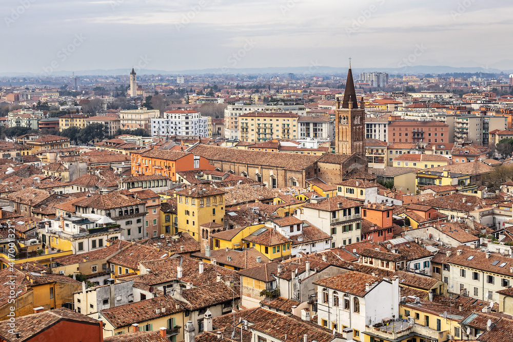 Wall mural picturesque aerial view of the city of verona from the torre dei lamberti at sunset. verona, veneto 