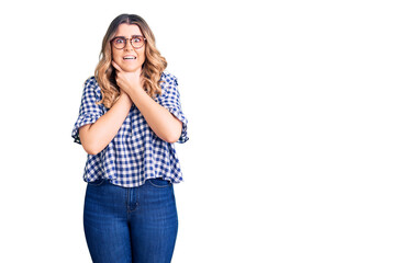 Young caucasian woman wearing casual clothes shouting and suffocate because painful strangle. health problem. asphyxiate and suicide concept.