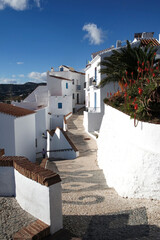 Fototapeta premium Frigiliana Spain. Traditional white historic Spanish village at the Costa del Sol. Moorish quarter with charming cobbled lanes and striking angular views.