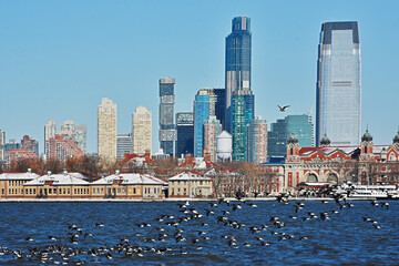 Ellis Island and Lower Manhattan skyline, New York City seen from Liberty State Park, New Jersey.