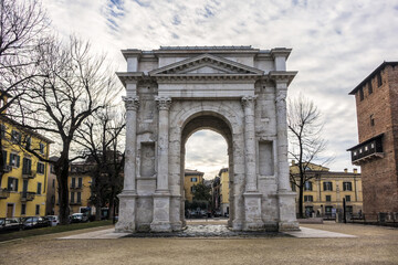 Fototapeta na wymiar The Arco dei Gavi is a monumental Roman architecture of Verona, erected around middle of first century along Via Postumia just outside the walls of the Roman city. Verona, Italy.