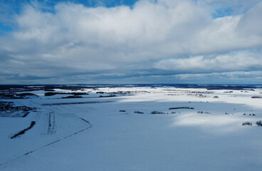 Top view of a snowy winter field