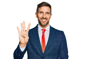 Handsome man with beard wearing business suit and tie showing and pointing up with fingers number four while smiling confident and happy.