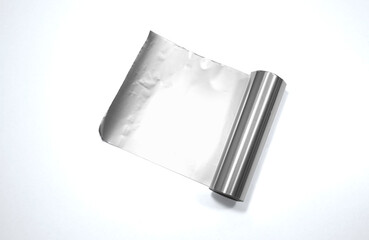 A roll of aluminum foil on a white background. Foil for the hairdresser