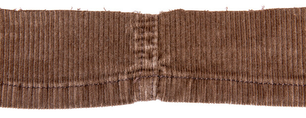Brown cotton traditional corduroy retail in middle, with tattered around, against white background