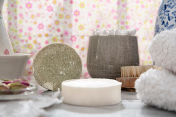 Spotlight on ecological homemade soaps and solid shampoo in the bathroom