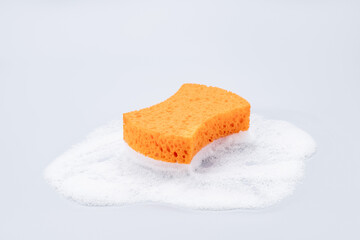 bath sponge with gel foam isolated on gray background. spa skin care concept