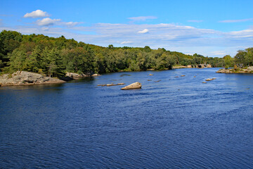 Fototapeta na wymiar Waterway in Maine with boulders