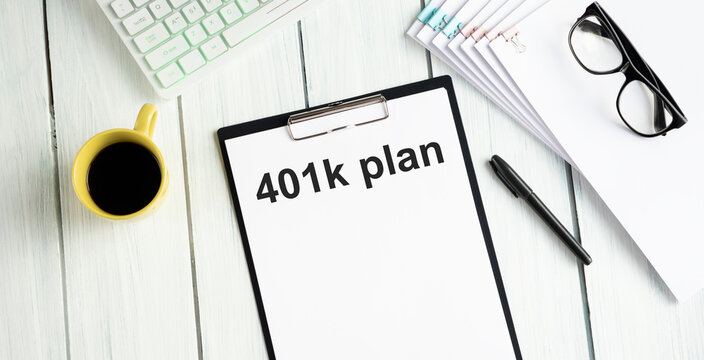 Paper with 401k plan on a table