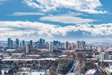 Ankara, Turkey - February 16 2021: Aerial view of traffic on inonu boulevard and skyscrapers in sogutozu district in background.