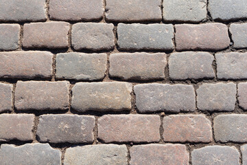 Background of a large, ancient cobblestone