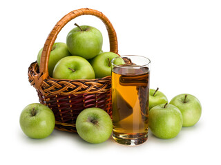 Glass with apple juice and basket with fruits of green apples