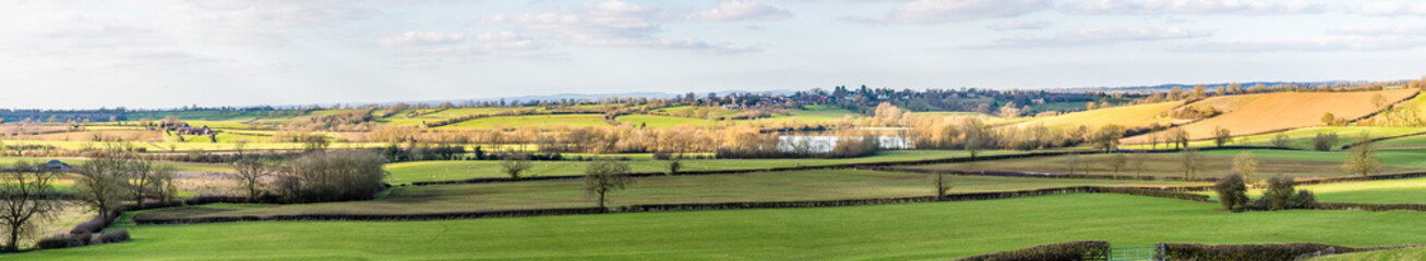 Fototapeta na wymiar A panorama view across the reservoir and fields around Saddington, UK in Springtime