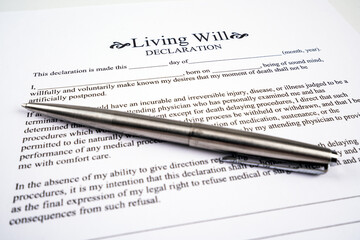 Living will declaration form with pen on top.