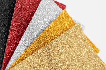 Close up view of Film Stickers with multicolored glitter effect finish.