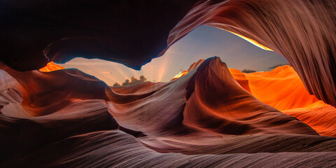 Panorama beautiful wide angle view of amazing sandstone formations in famous Antelope Canyon on a sunny day with blue sky near the old town of Page at Lake Powell, American Southwest, Arizona, USA © emotionpicture
