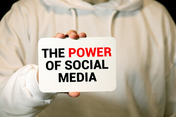 power of social media phrase and light bulb, hand writing Networking Marketing Internet