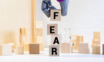 the word FEAR on wood blocks