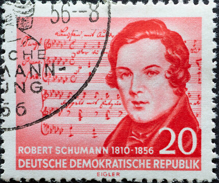 GERMANY, DDR - CIRCA 1956  : a postage stamp from Germany, GDR showing a half-length portrait of Robert Schumann. From mistaken notes by Franz Schubert. 100th anniversary of Robert Schumann's death
